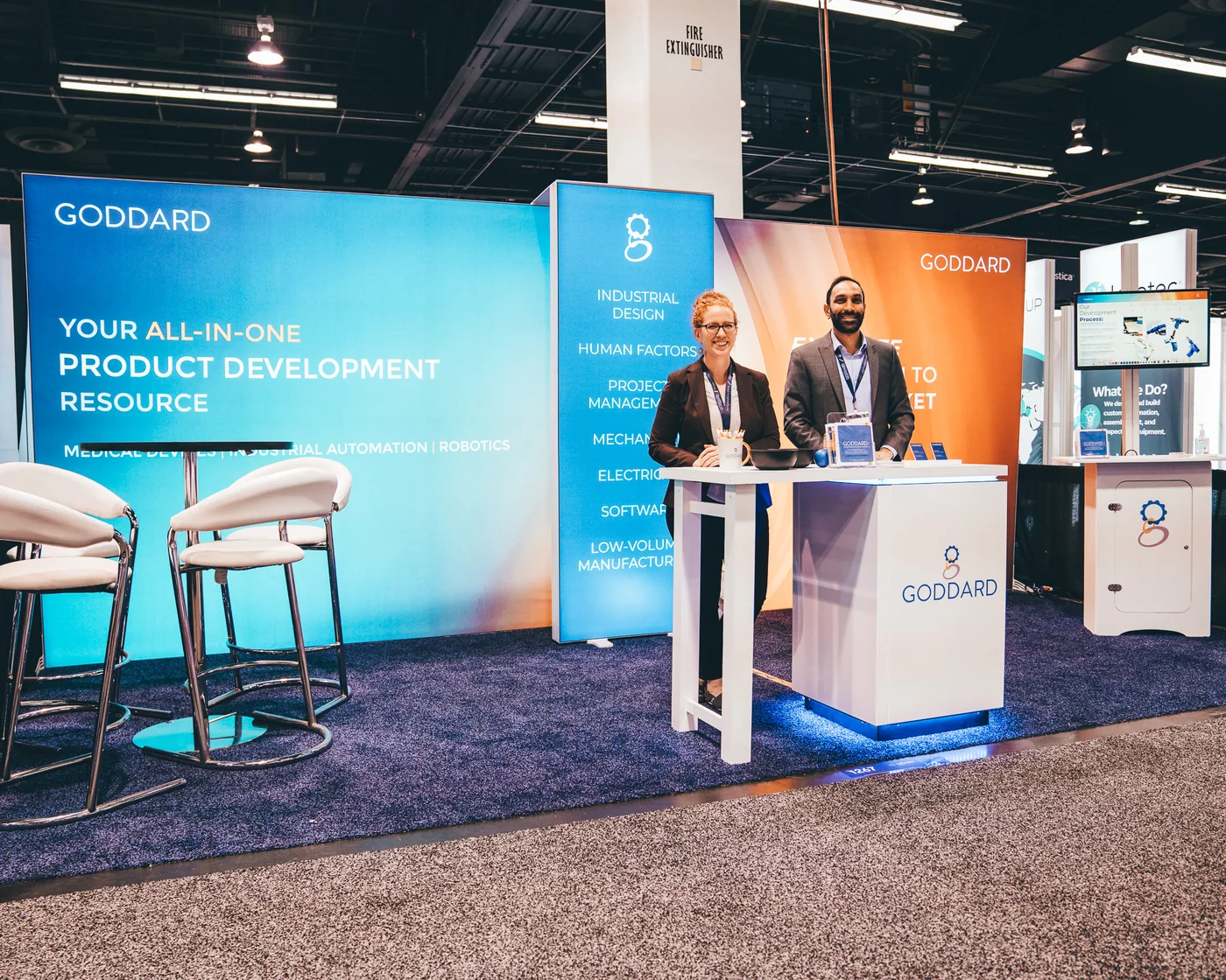 Complete Goddard trade show booth with backwall and presentation counter